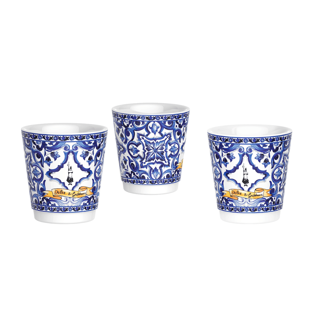 Three ceramic cups with blue and white patterns on a white background