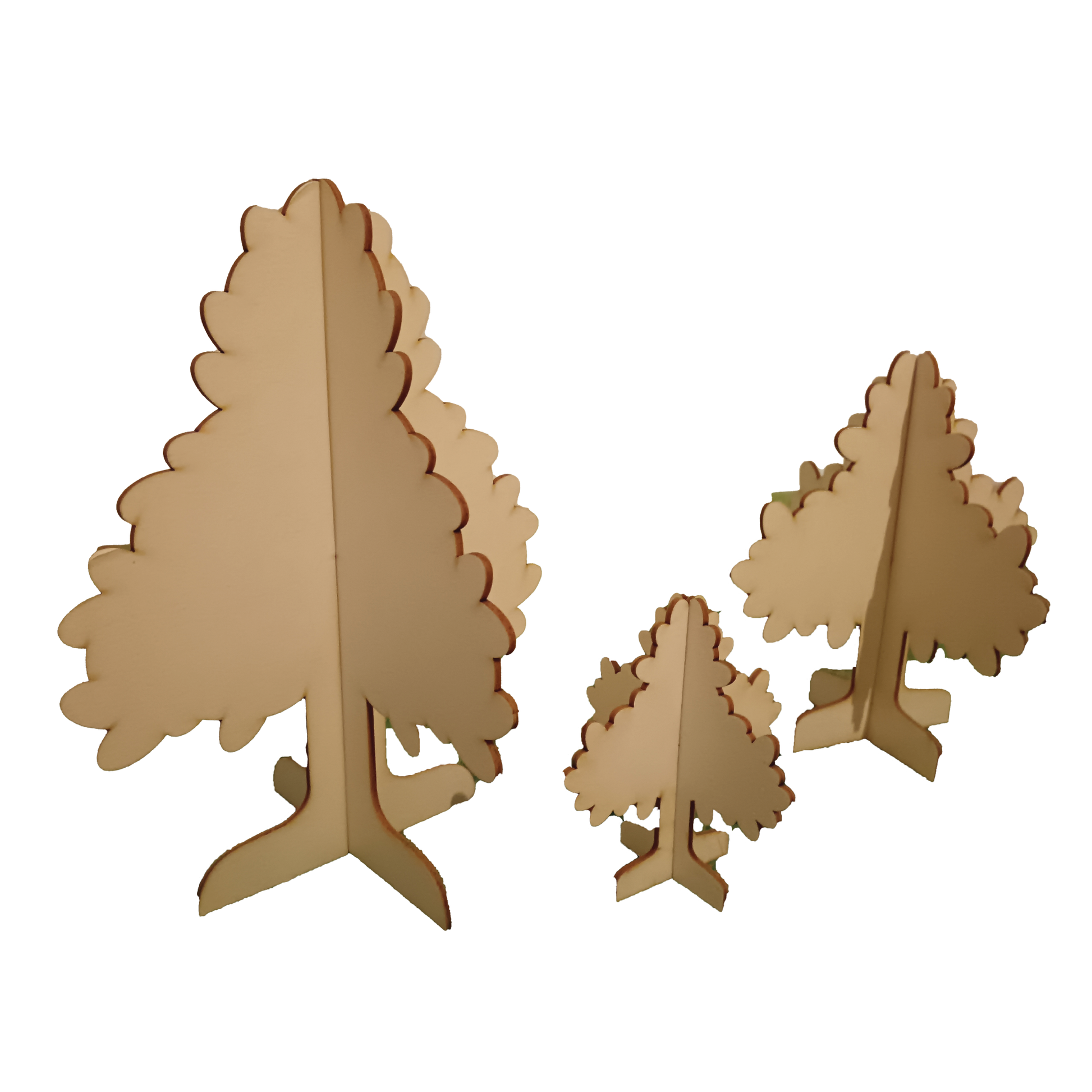 Set of three wooden tree-shaped decorations on a white background