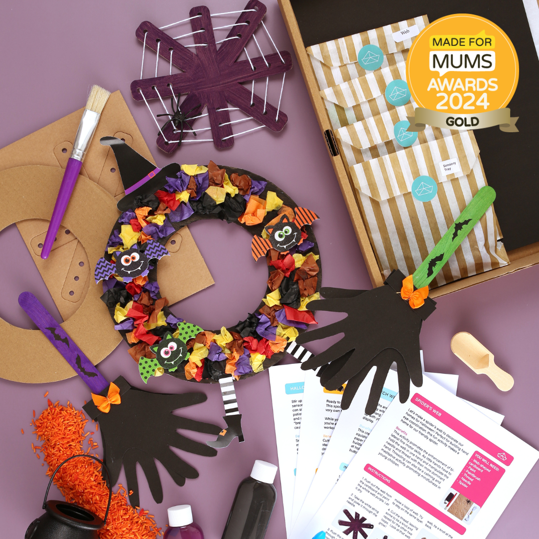 Halloween craft kit with wreath, hands, and supplies on a purple background, featuring 'Made for Mums Awards 2024 Gold'.