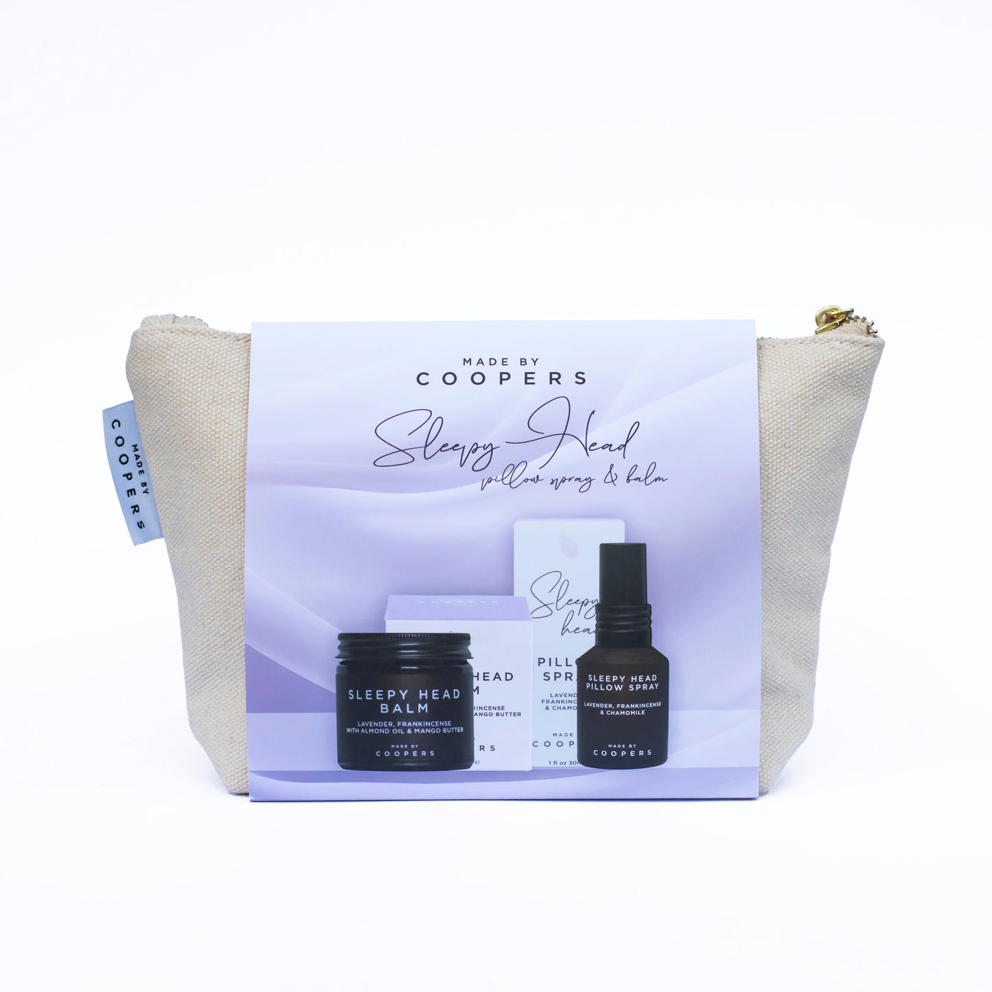 Coopers Sleepy Head product set with pillow spray, balm, and pouch on a white background