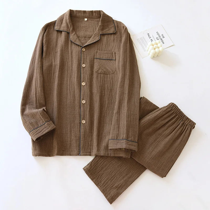Brown pajama set with shirt and pants on a white background