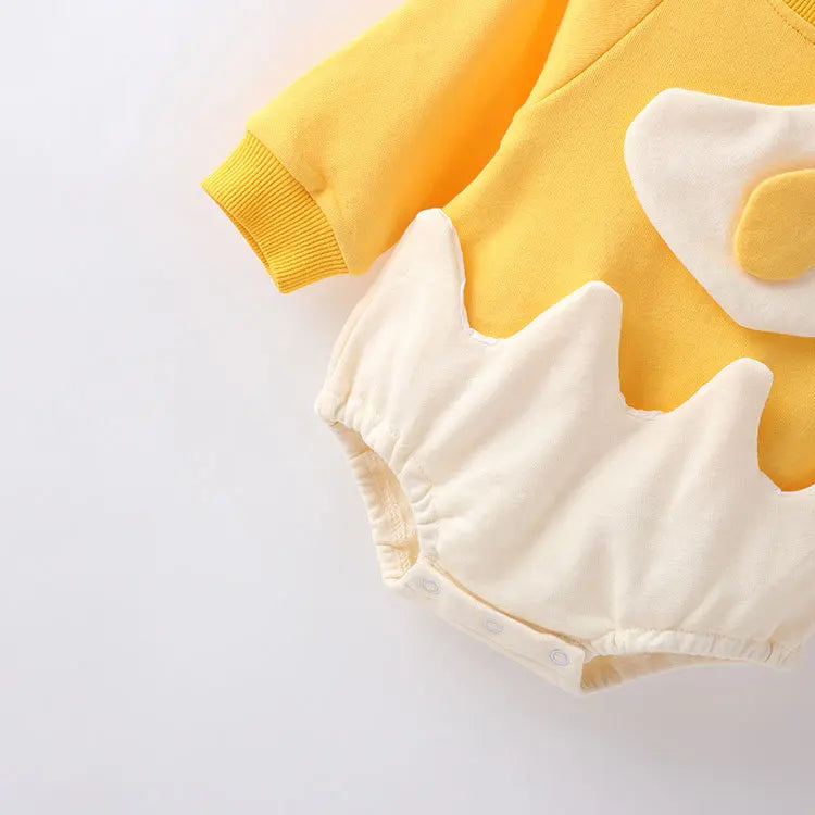 Yellow baby romper with a white cloud design on a light gray background