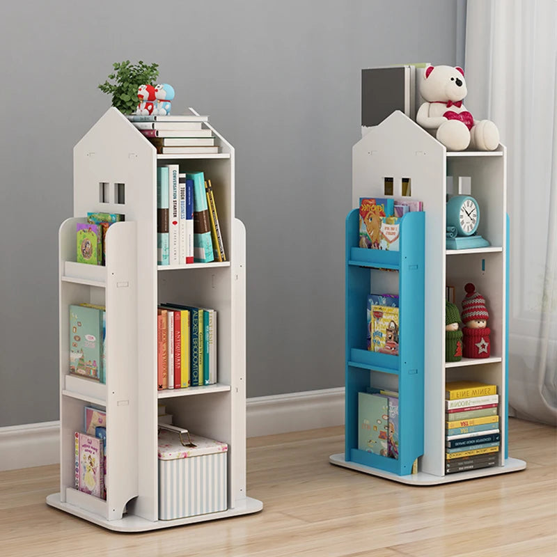 Two children's bookshelves with books and toys on a wooden floor against a gray wall.