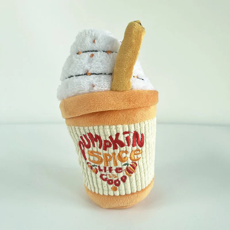 Dog Toy resembling a pumpkin spice latte with a snowman on top against a white background