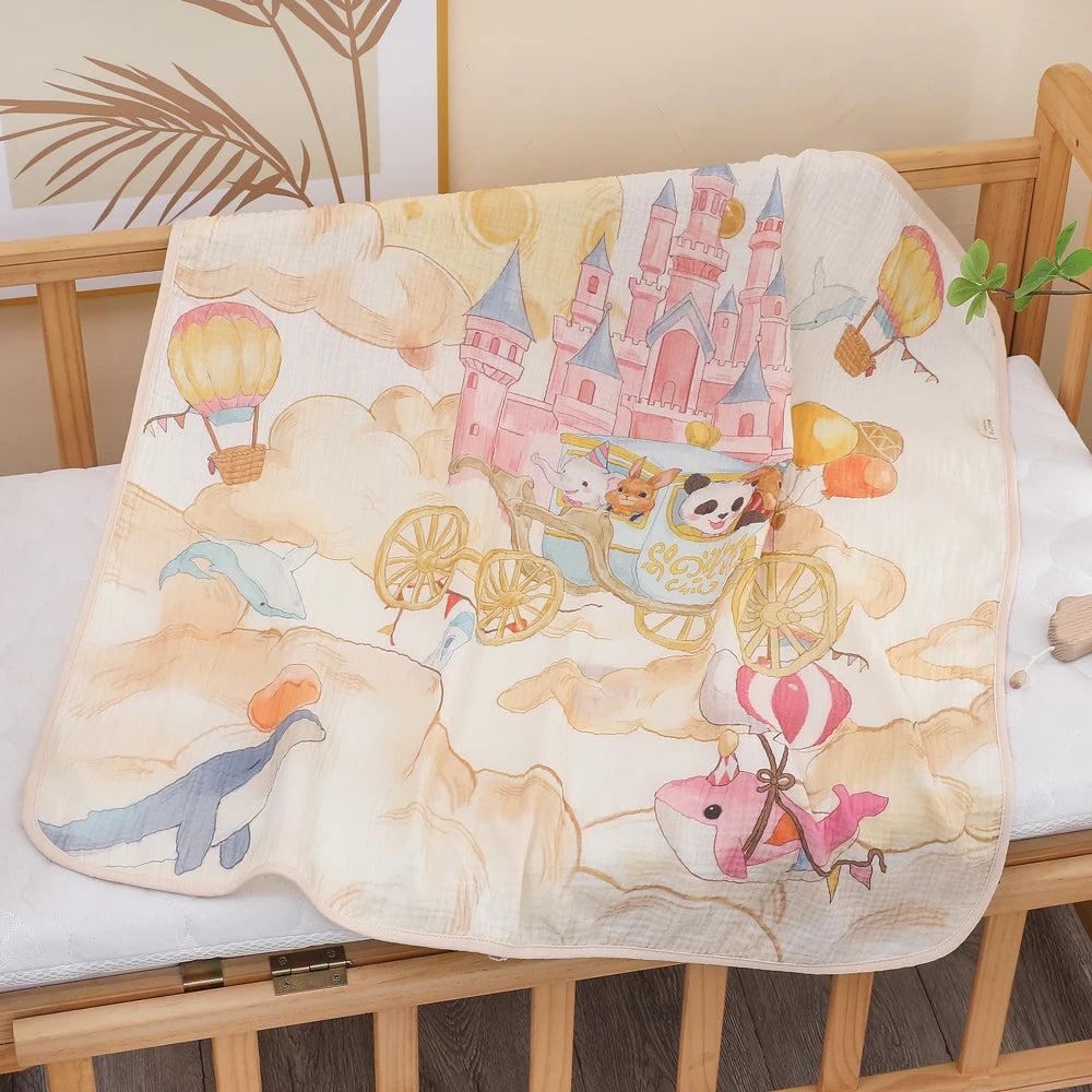 Children's towel with castle and hot air balloon design on a crib