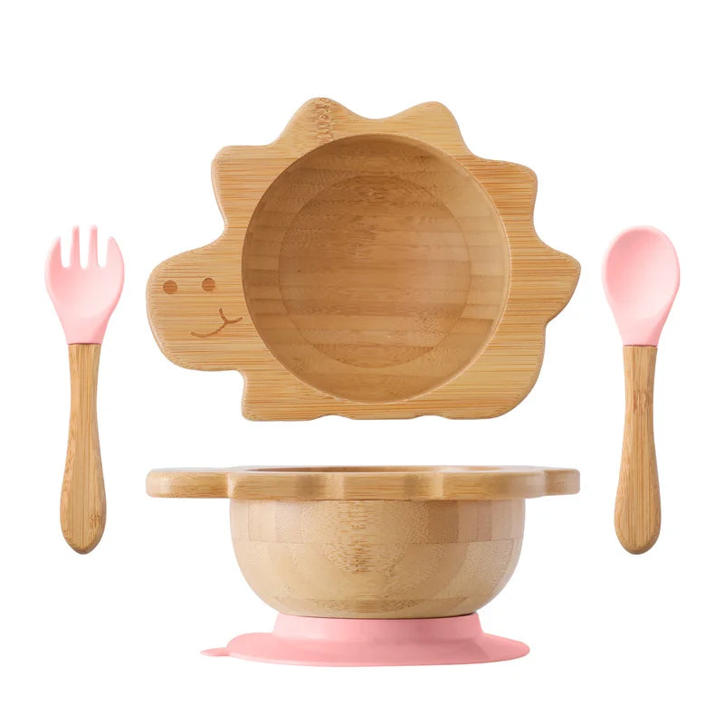 Bamboo children's dinner set with pink accents on a white background