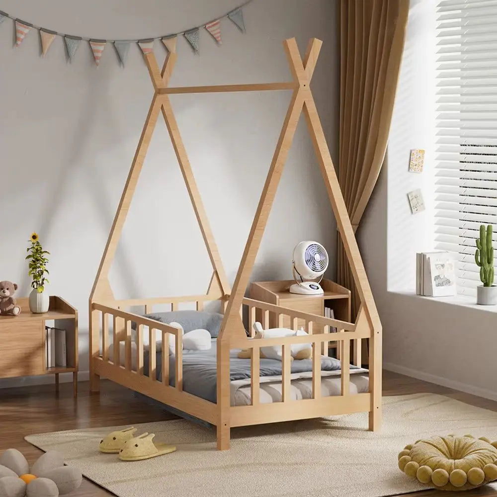 Wooden children's bed with a teepee design in a room with a fan and plants.