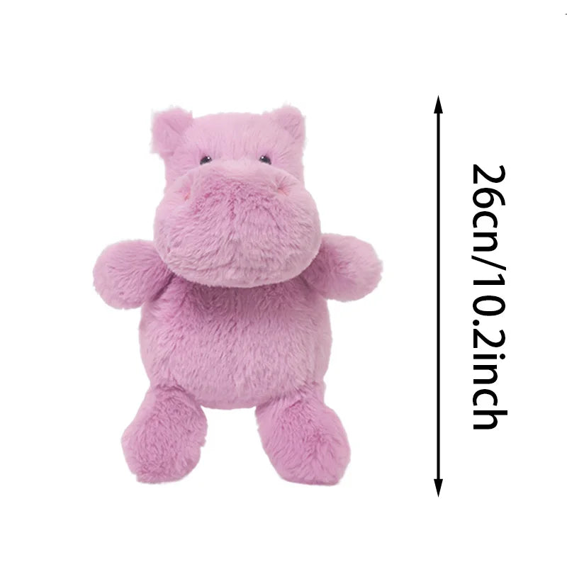Pink plush hippo toy with dimensions on a white background