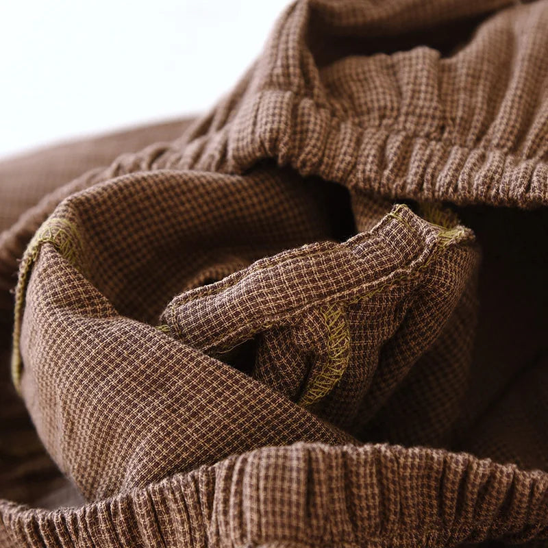 Close-up of a brown textured fabric with a blurred background
