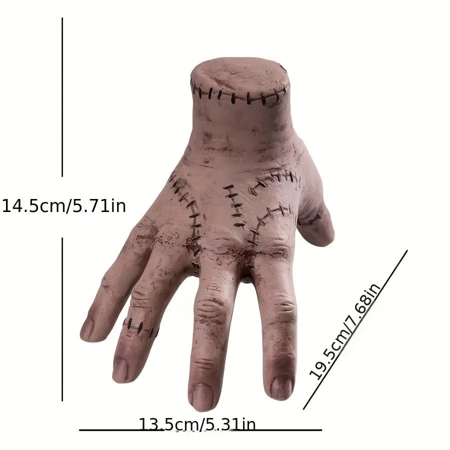 Voodoo doll hand with measurements on a white background