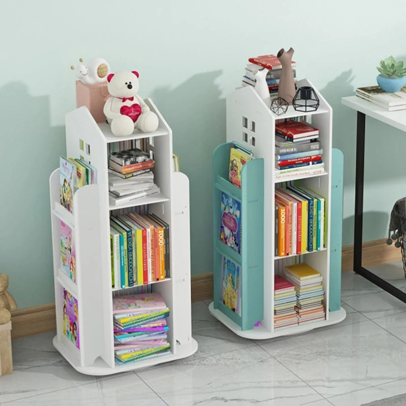 Two children's bookshelves with books and toys against a light blue wall.