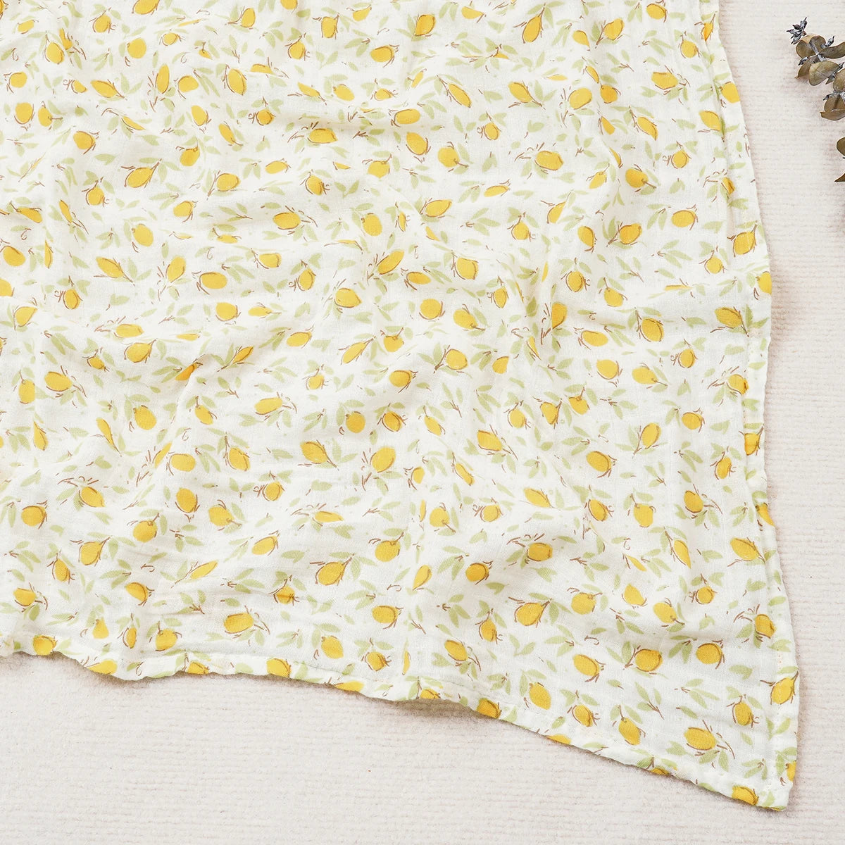 Fabric with yellow floral pattern on a white background