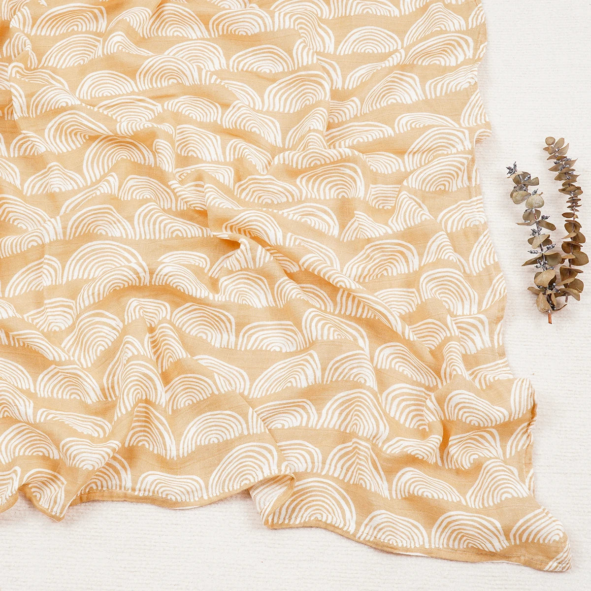 Beige fabric with white wave pattern on a white background