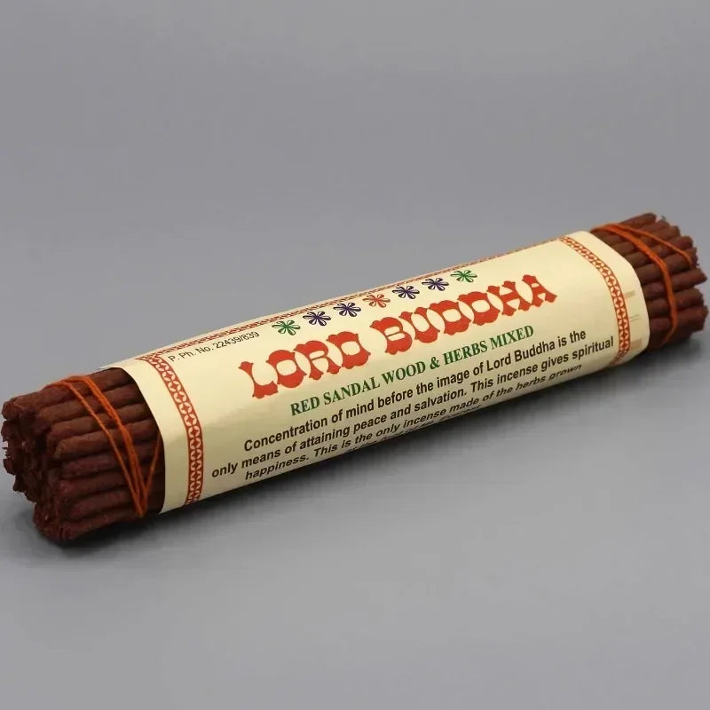 Roll of Lord Buddha incense sticks with a label on a gray background