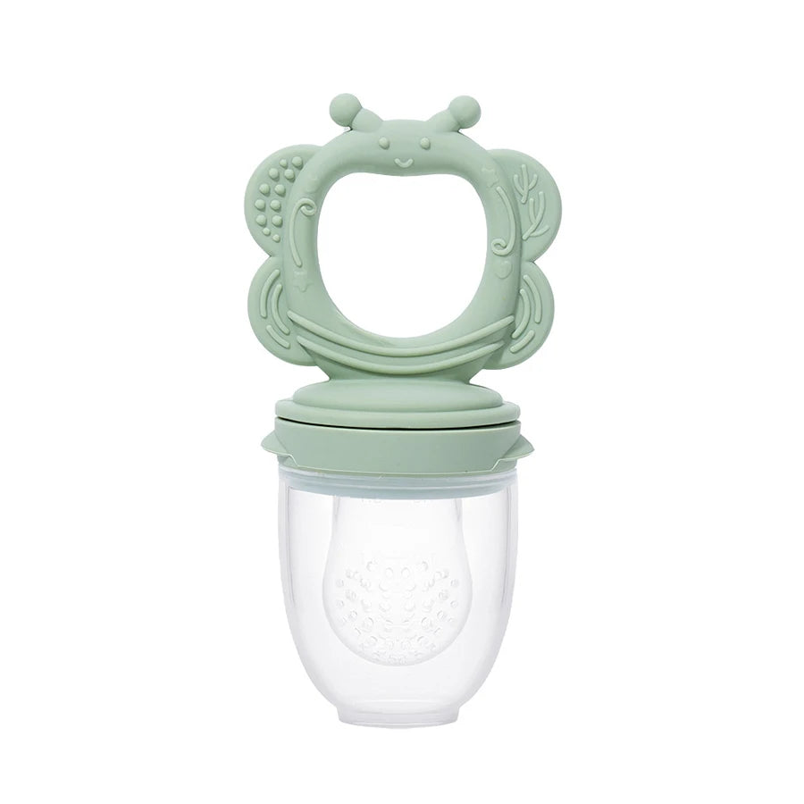 Green silicone teething toy with a clear base on a white background