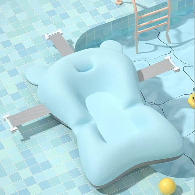 Blue bear-shaped pool float on a tiled pool floor with a ladder in the background.