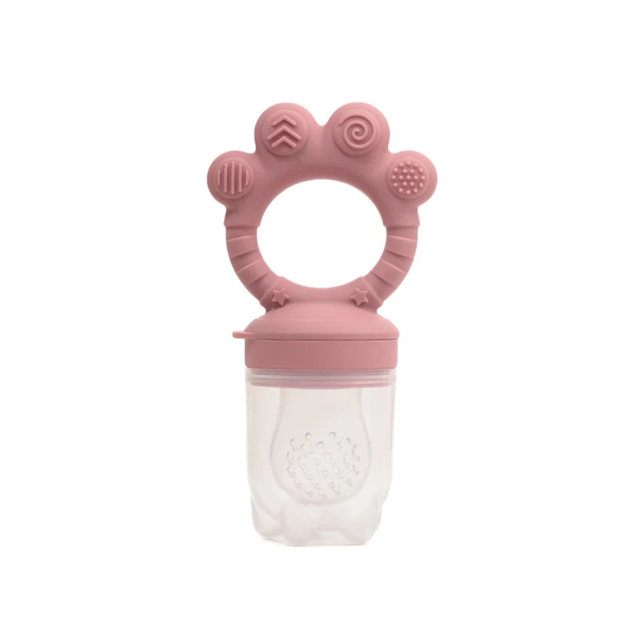 Pink silicone fruit pouch with a teething ring on a white background