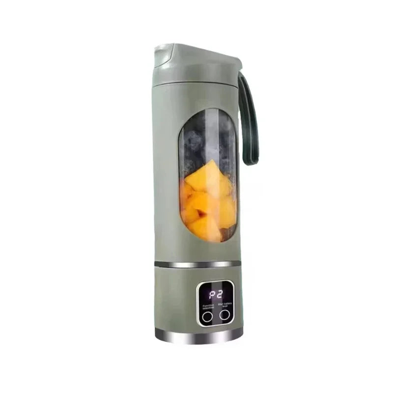 Portable blender with fruit inside on a white background