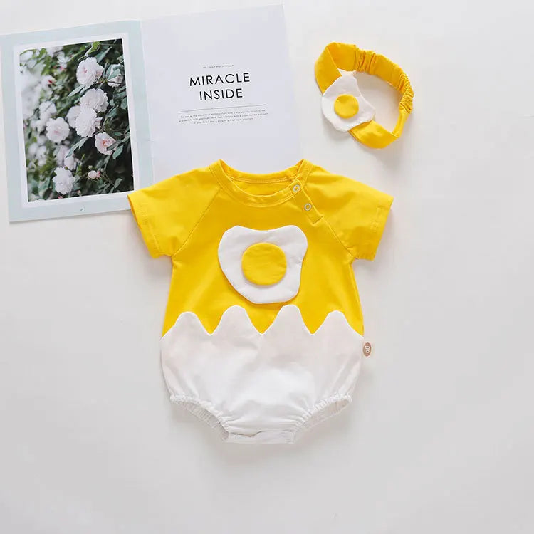 Yellow and white baby romper with matching headband on a light gray background