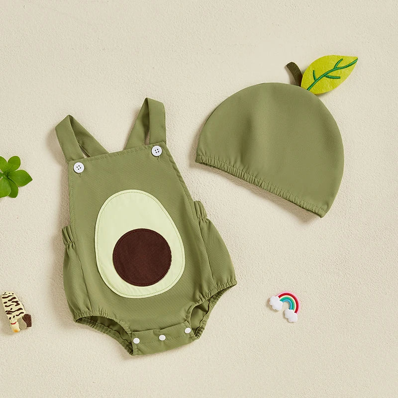 Avocado-themed baby romper and hat set on a beige background
