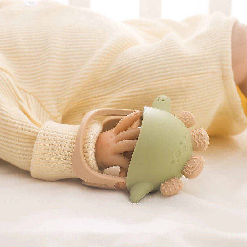 BPA Free Dinosaur Silicone Teething Glove - baby and toddler from Dear Cece - Just £8.99! Shop now at Dear Cece