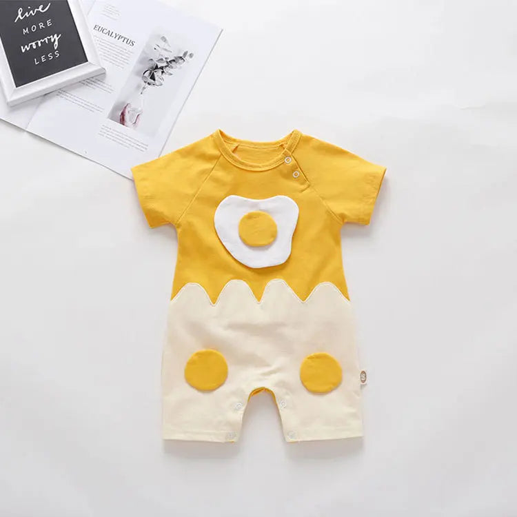 Yellow and white baby romper with cartoon design on a light gray background