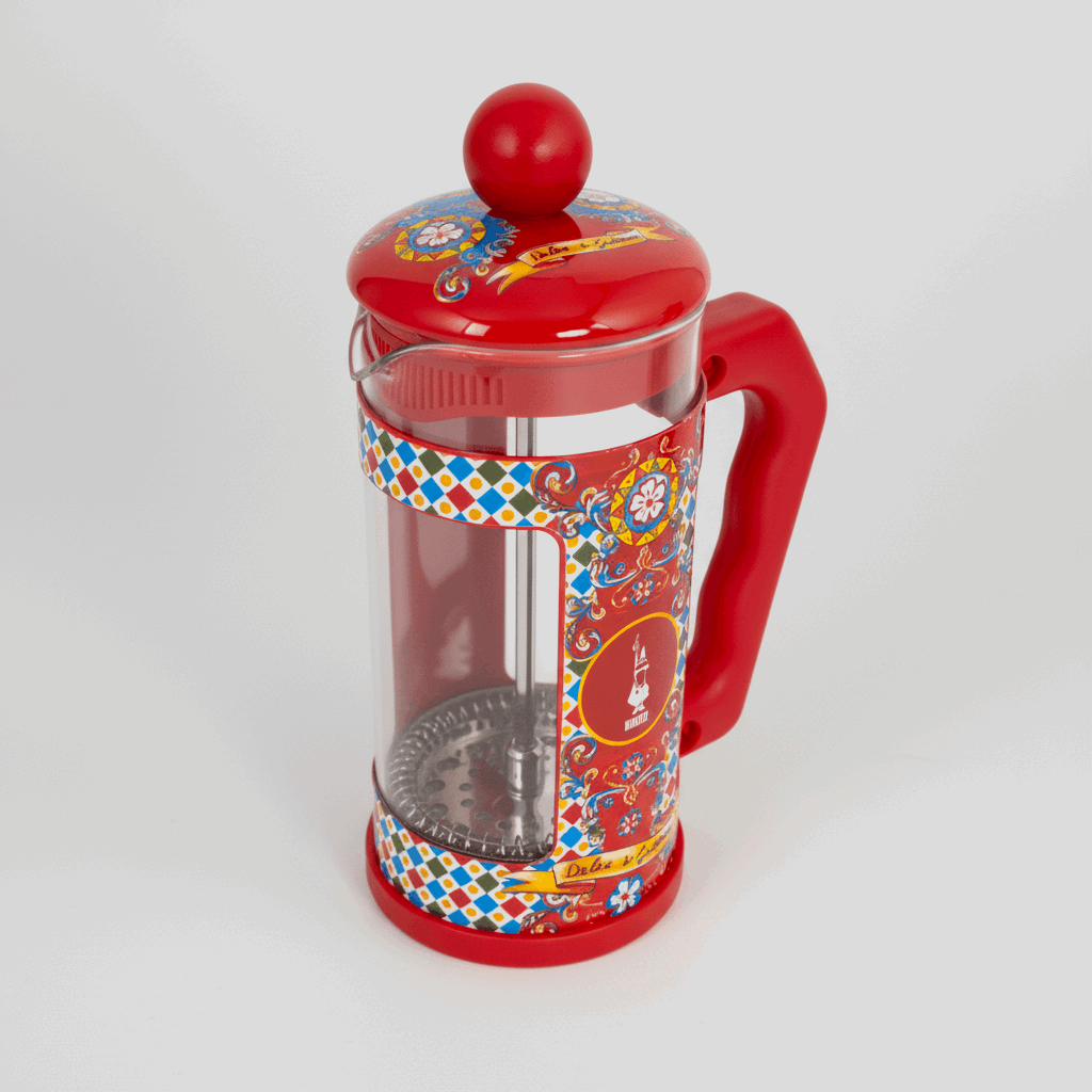 Red French press coffee maker with colorful pattern on a transparent background