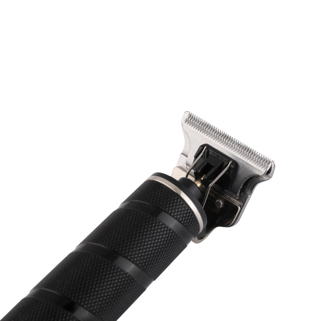 Black grooming clipper on a white background