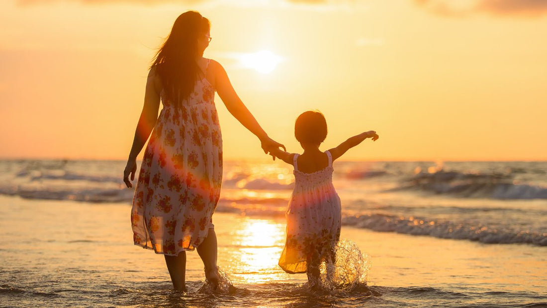 Mother and daughter on the beach