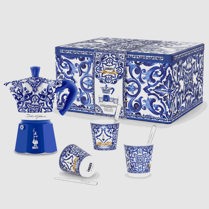Blue and white ceramic set with decorative patterns on a white background