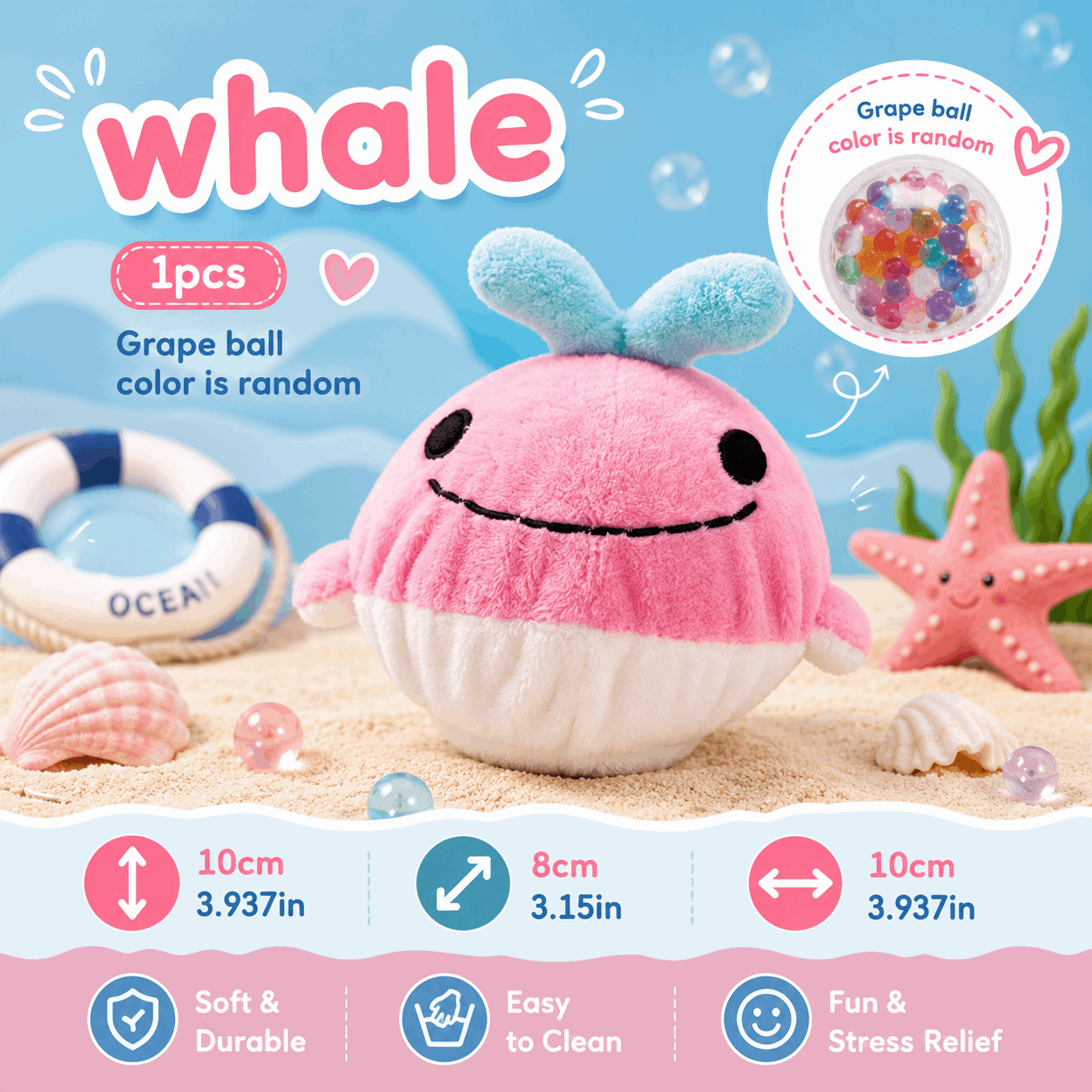 Plush whale toy with colorful grape balls on a beach-themed background
