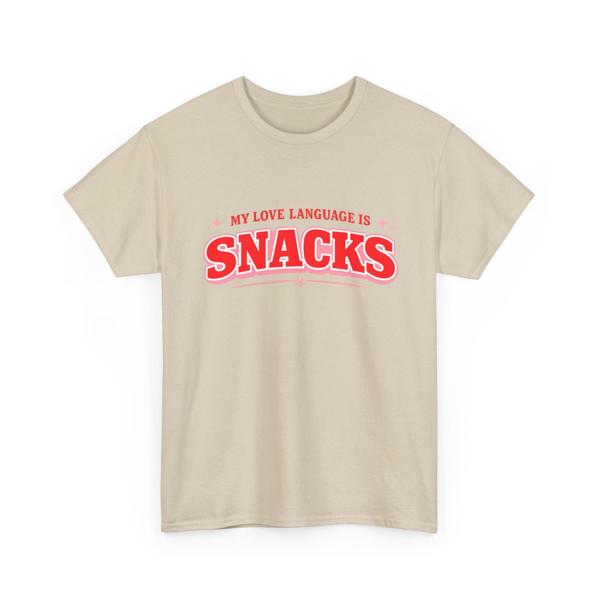 A light beige crewneck t-shirt with a red graphic text print reading 'MY LOVE LANGUAGE IS SNACKS' on the chest, displayed against a solid white background.