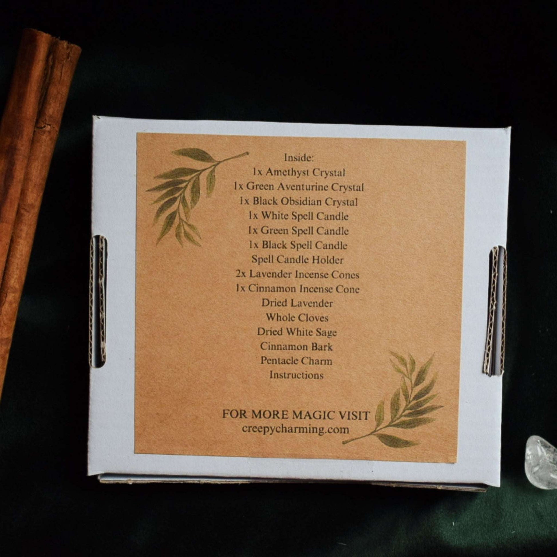 Box with spell components and instructions on a dark background