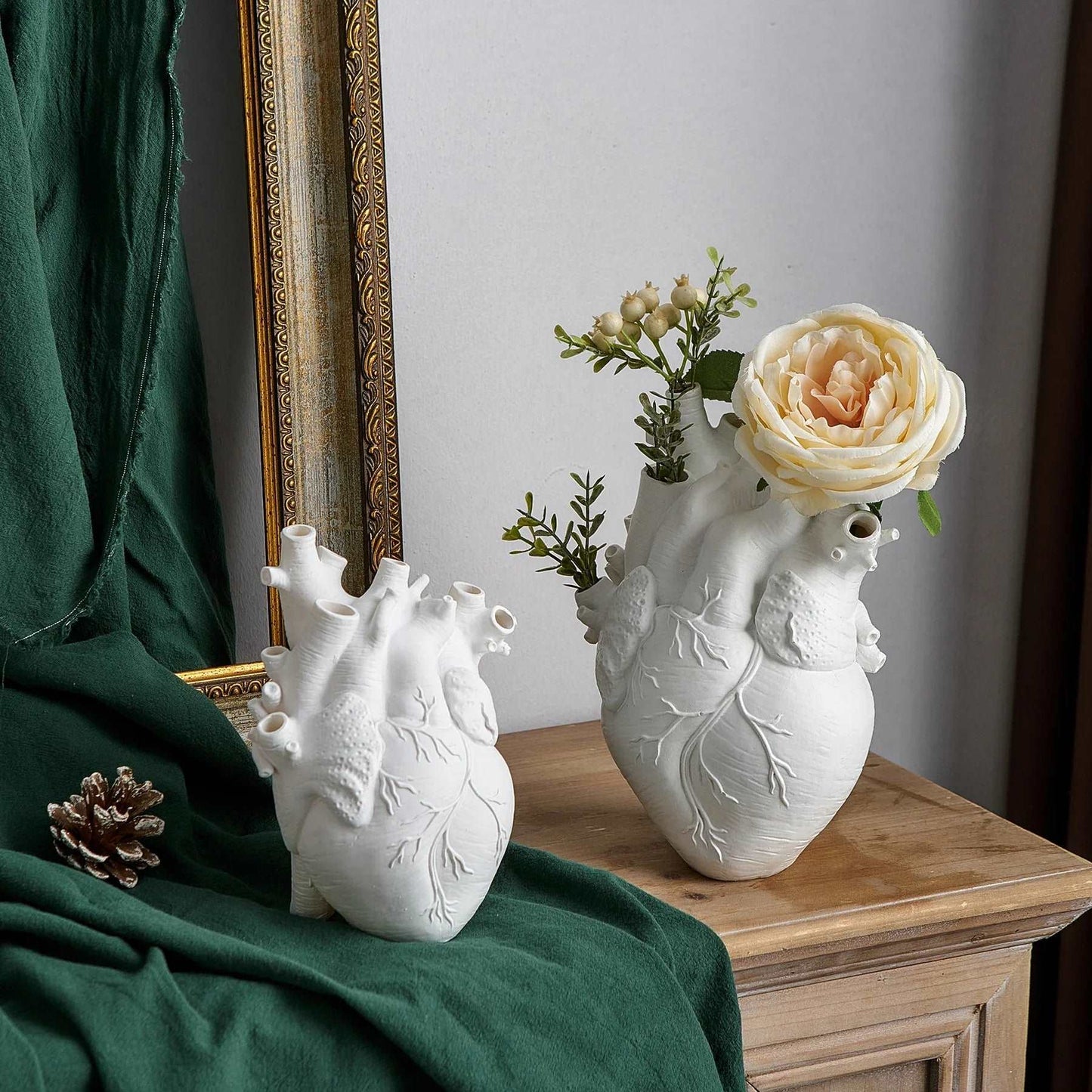 white vase with flowers human heart