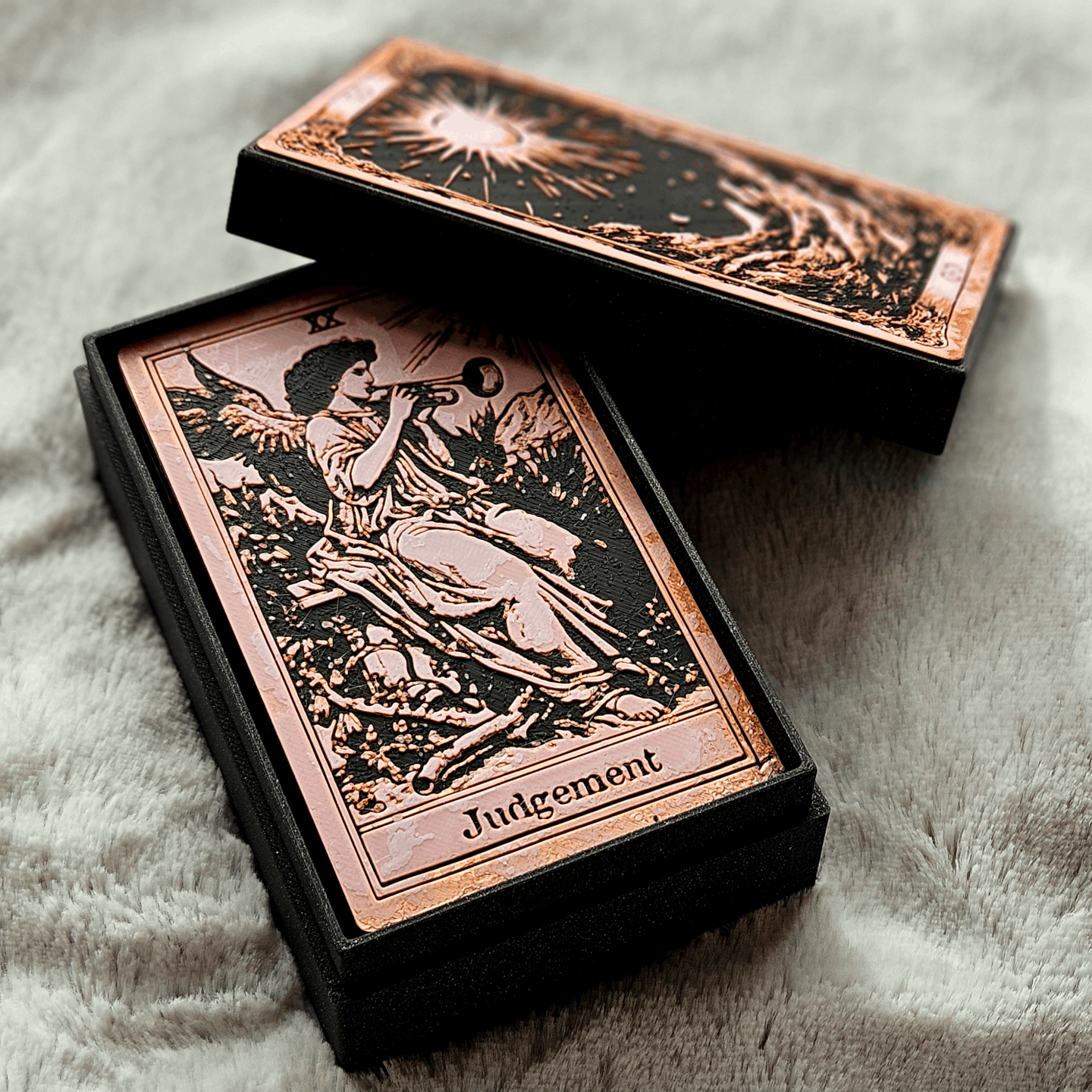 Tarot card with 'Judgement' card design on a textured surface