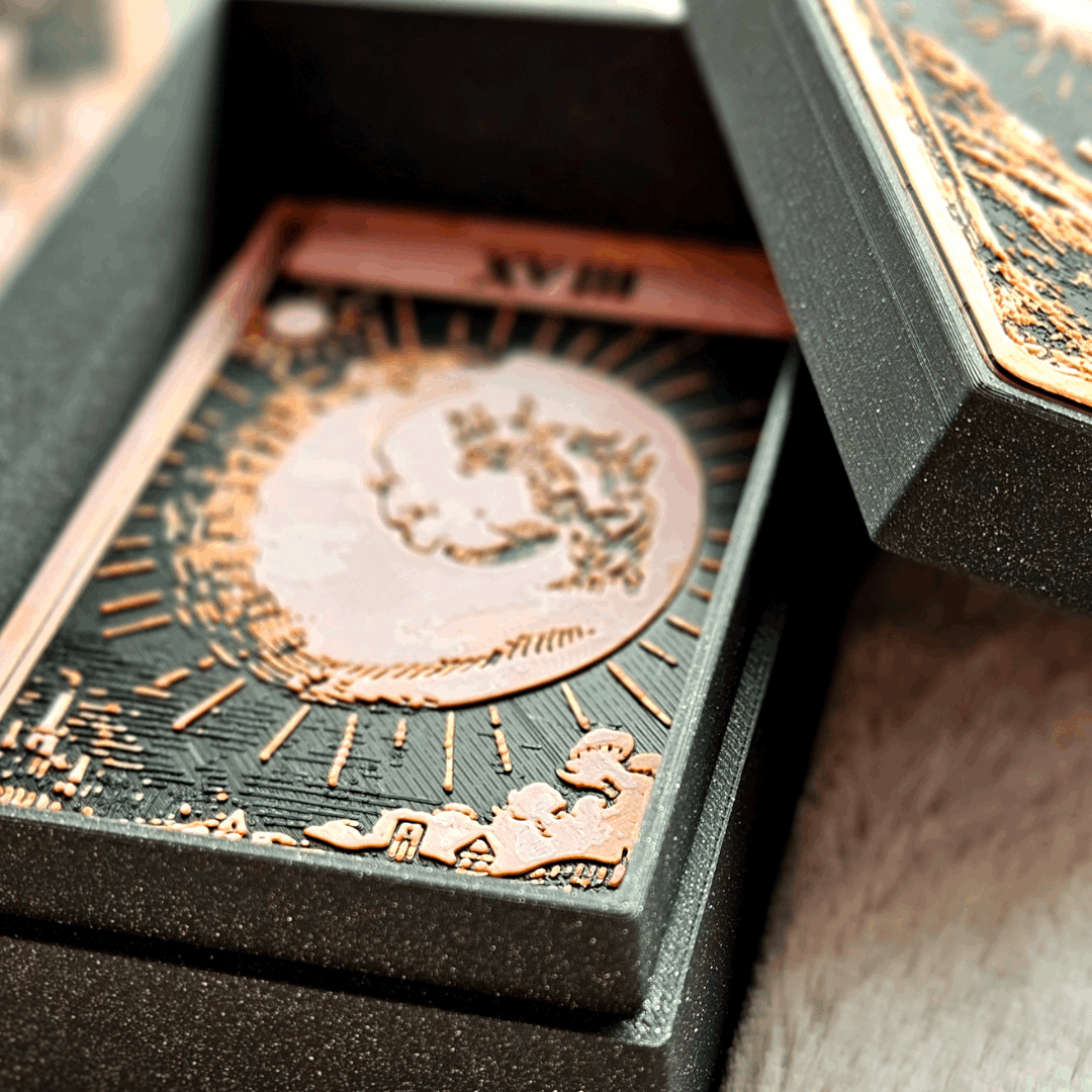 Decorative box with intricate designs on a wooden surface