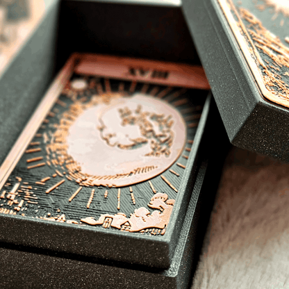 Decorative box with intricate designs on a wooden surface