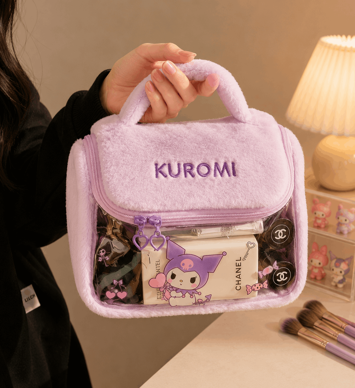 Purple Kuromi-themed cosmetic bag with makeup items on a neutral background