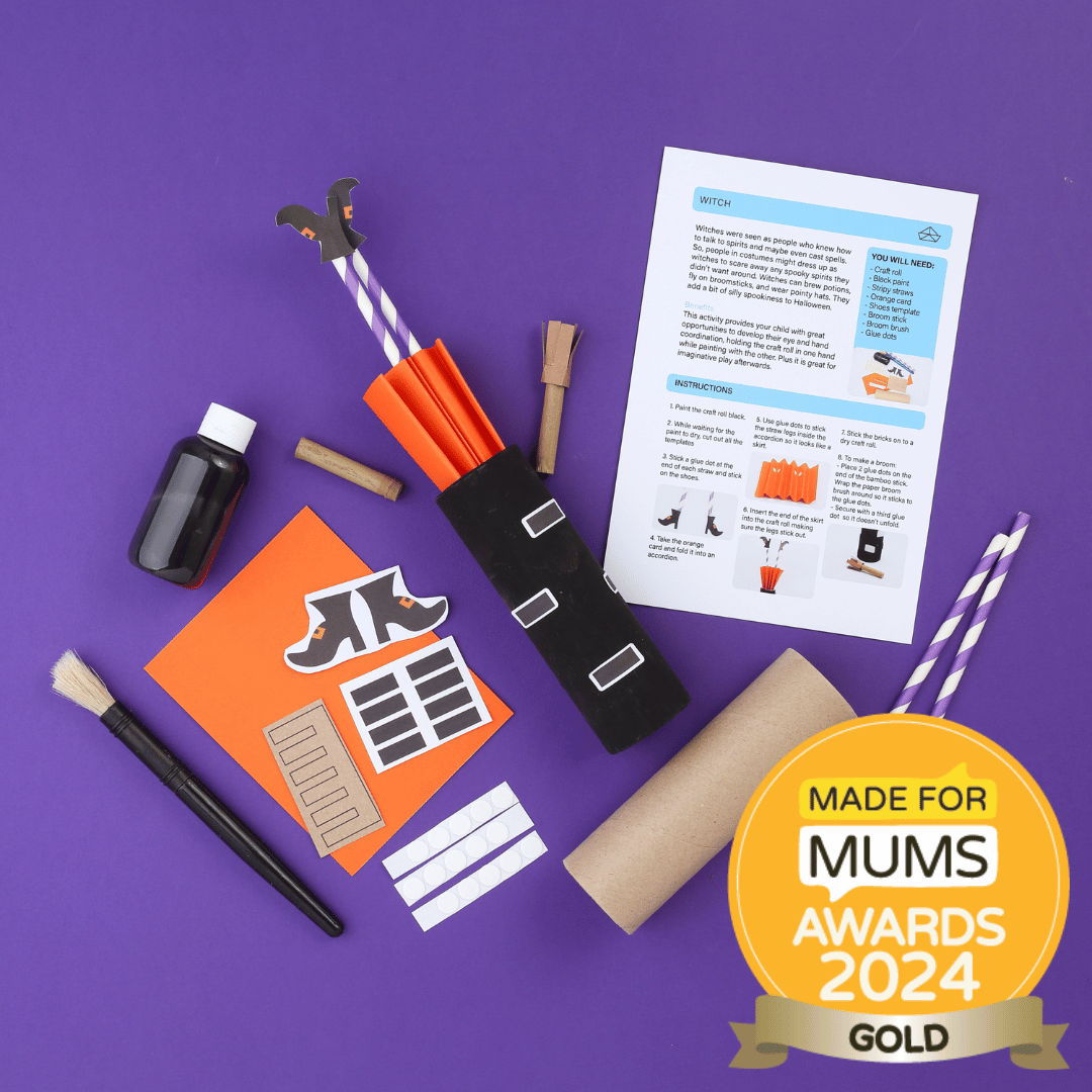 Halloween-themed craft kit with supplies and instructions on a purple background, featuring 'Made for Mums Awards 2024' gold badge.