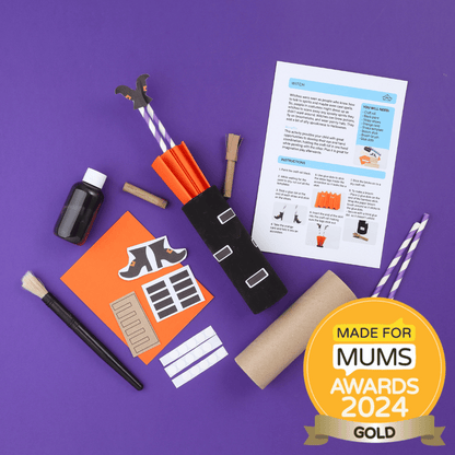 Halloween-themed craft kit with supplies and instructions on a purple background, featuring 'Made for Mums Awards 2024' gold badge.