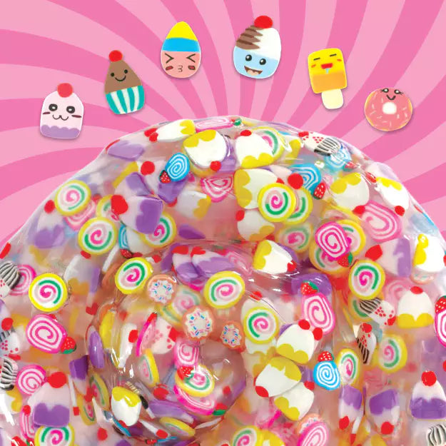 Colorful slime with candy-themed decorations on a pink background
