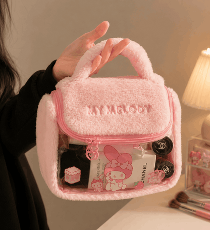 Pink fluffy makeup bag with 'MY MELODY' branding, containing cosmetic items.