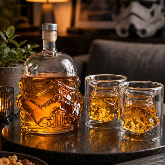 Stormtrooper-shaped whiskey decanter with glasses on a table, surrounded by 'Star Wars' memorabilia.