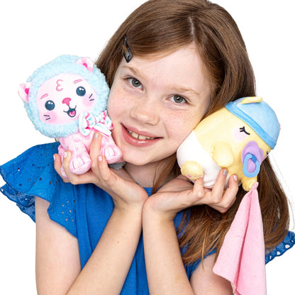 Young girl holding two colorful plush toys against a white background