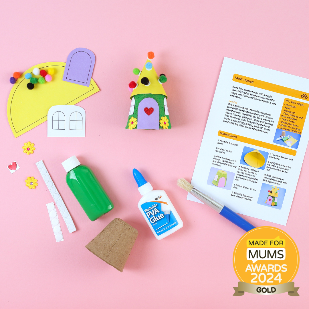 Craft materials and instructions for making a paper house on a pink background, with 'Made for Mums Awards 2024 Gold' badge.