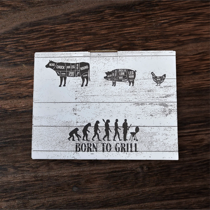 Wooden cutting board with grill diagram and 'Born to Grill' text on a wooden surface