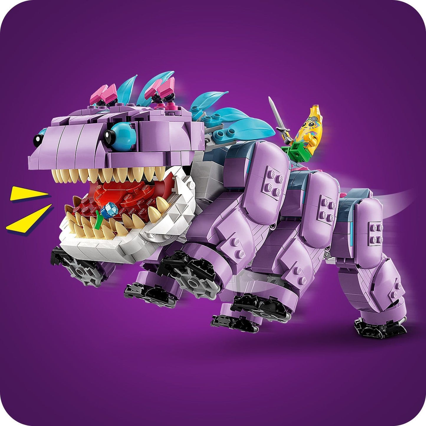 Toy dinosaur model on a purple background