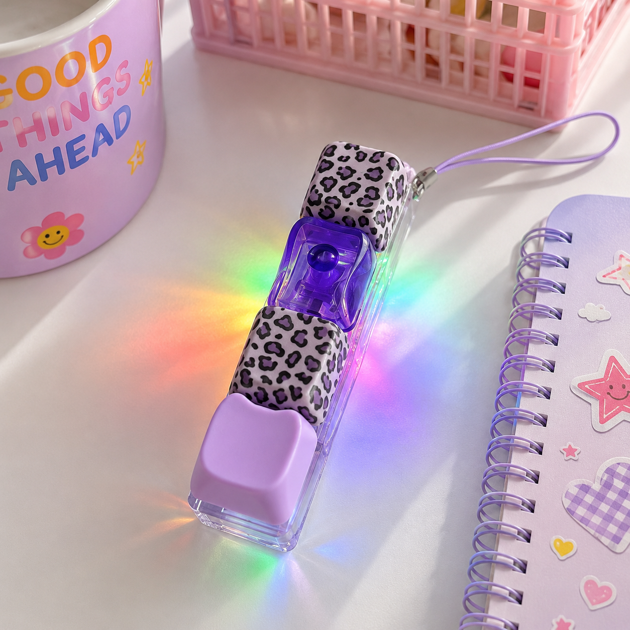 LED light-up pen with leopard print case on a white surface with colorful lighting effects.