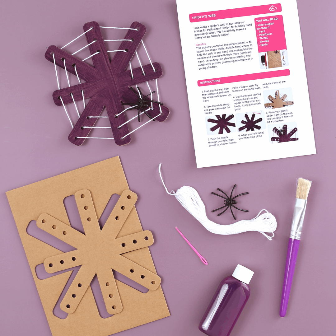 Spider web craft kit with templates, glue, paint, and instructions on a purple background