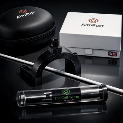 AimPutt golf putter accessories including a black case, white box, and clear tube on a reflective surface.